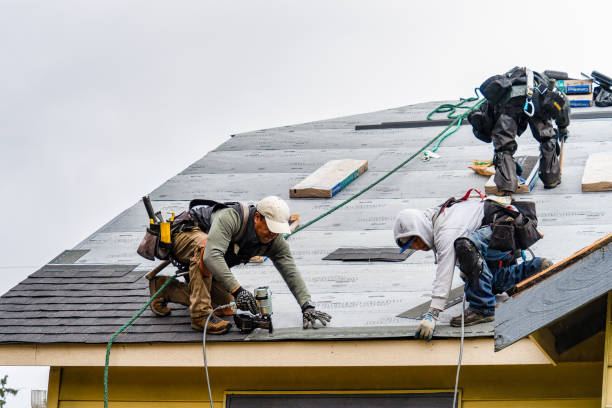 Professional Gutter Installation technician working in Woodside, CA